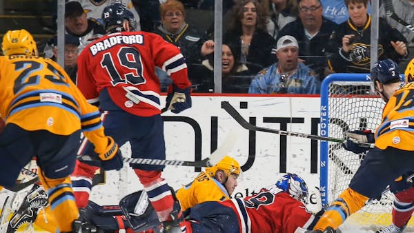 Hawkins pokes game-winning goal in 3-2 overtime win